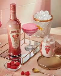 KIT LICOR AMARULA RASP 750ML+1 CREAM 50M